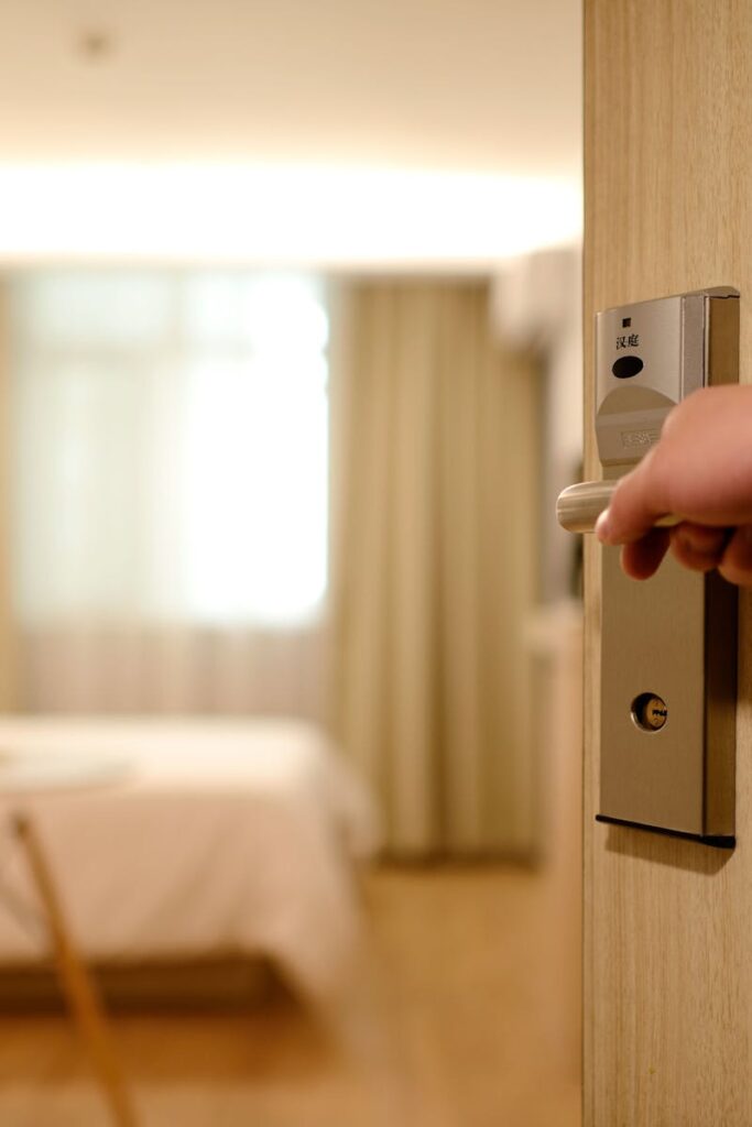 pexels-photo-271639-271639 A soft-lit hotel room entrance, welcoming guests with luxury appeal and comfort.